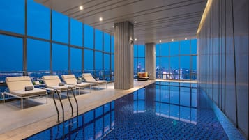 Indoor pool, open 9:00 AM to 10:00 PM, sun loungers, lifeguards on site