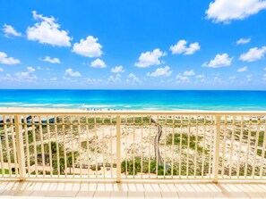 A balcony with a view of a beach and ocean. - Corner Unit A1110 Kng/Qn/Bunk/Sofa Sleeper Direct Gulf View-WIFI - Sleeps 9 (Gulf Shores)