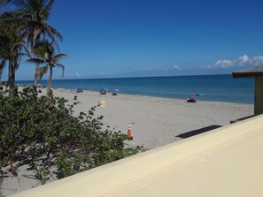 On the beach, sun loungers, beach towels