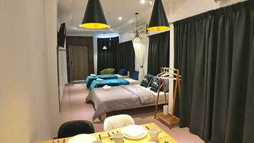 Studio | 1 bedroom, desk, blackout drapes, iron/ironing board