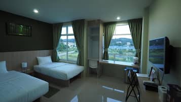 Desk, blackout curtains, free WiFi, bed sheets