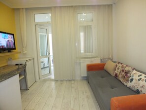 Classic Apartment, 2 Bedrooms (4 People) | Living room | LCD TV
