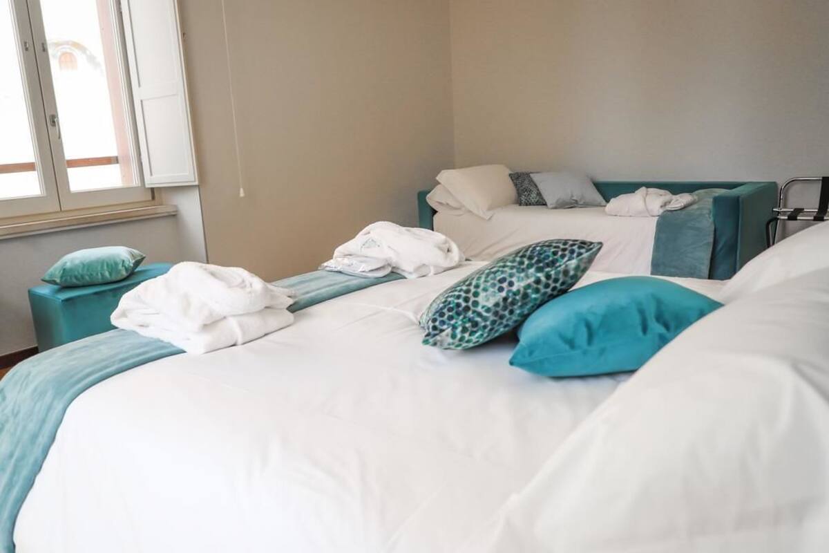 deluxe room | premium bedding, minibar, in-room safe, desk