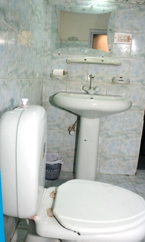 Shower, free toiletries, slippers, towels