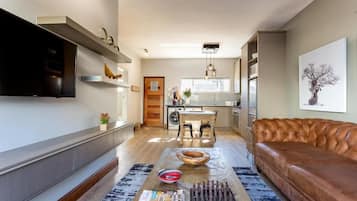 Appartement Confort, 1 très grand lit, non-fumeurs | Coin séjour | Télévisions à écran plasma, Netflix, services de streaming