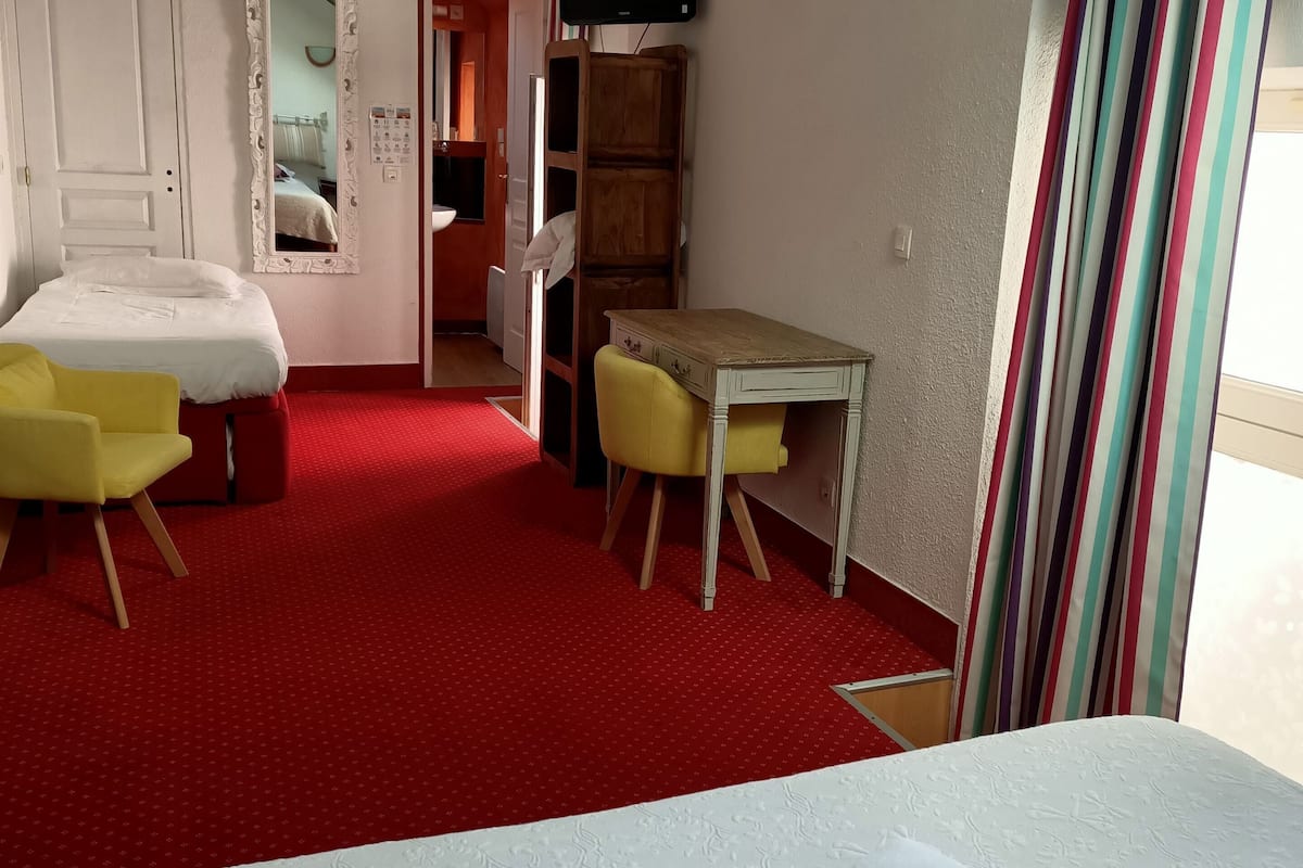 family room | individually decorated, individually furnished, desk, blackout curtains