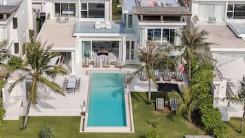 Outdoor pool, pool umbrellas, sun loungers