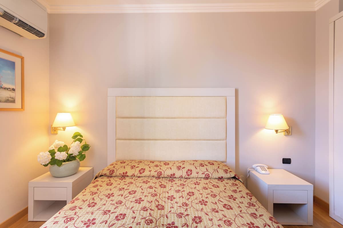 Premium bedding, pillow-top beds, in-room safe, iron/ironing board