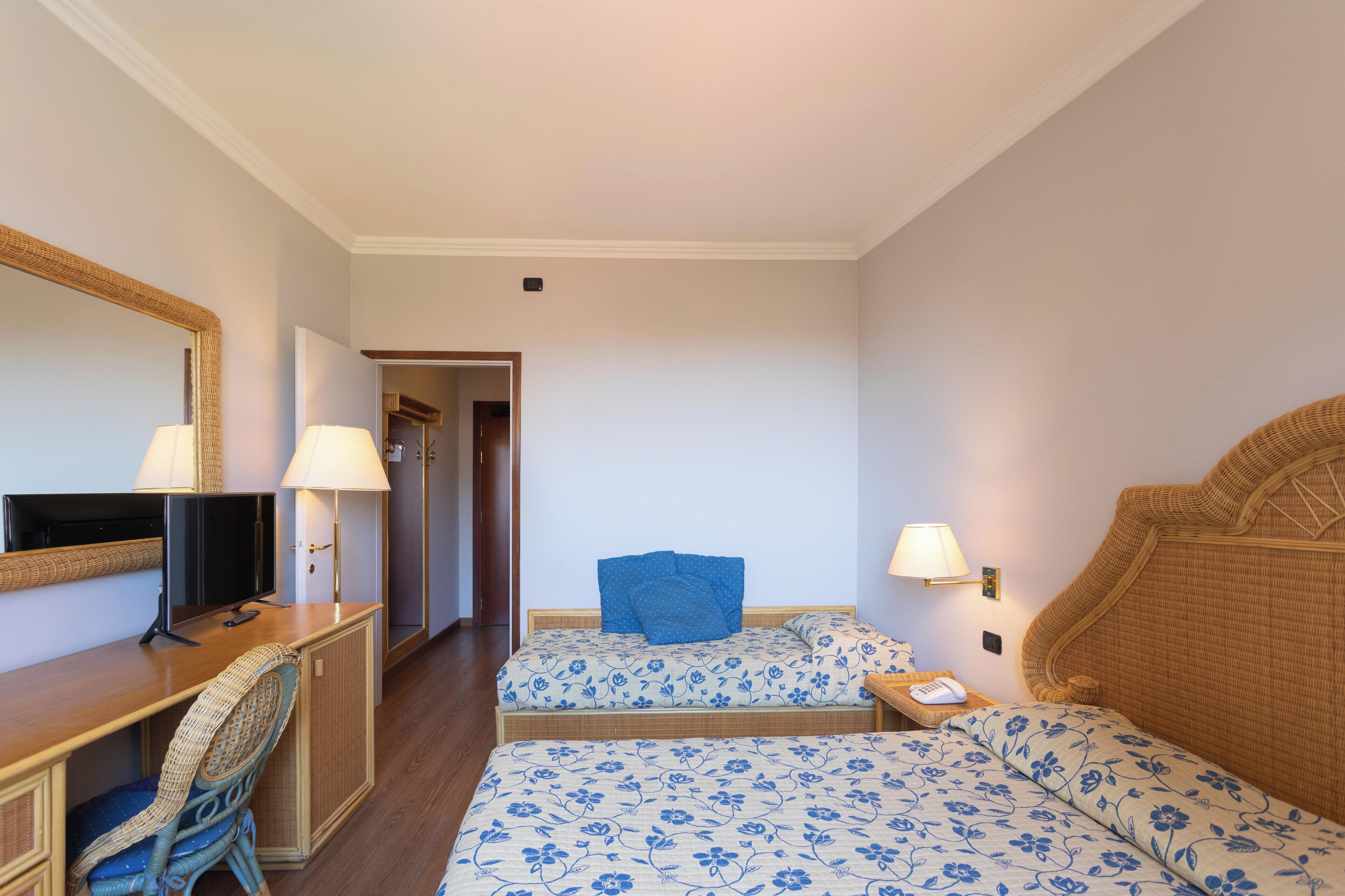 triple room | premium bedding, pillow-top beds, in-room safe, desk