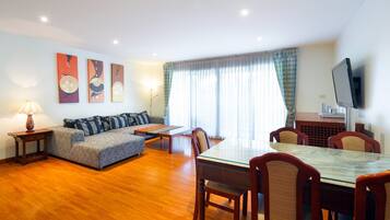 Two Bedrooms Condo | Living area | Flat-screen TV