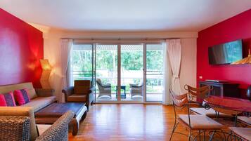 Two Bedrooms Condo | Living area | Flat-screen TV