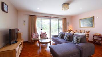 Two Bedrooms Condo | Living area | Flat-screen TV