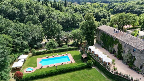 Seasonal outdoor pool, pool umbrellas, pool loungers