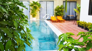 Outdoor pool, open 8:00 AM to 9:30 PM, sun loungers