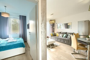 Deluxe Apartment | 1 bedroom, premium bedding, individually decorated, blackout drapes - Apartamenty OnHoliday w Kołobrzegu Poleska (Kolobrzeg)