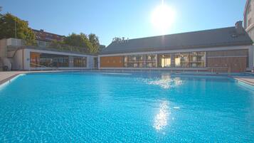 Indoor pool, seasonal outdoor pool, pool umbrellas, sun loungers