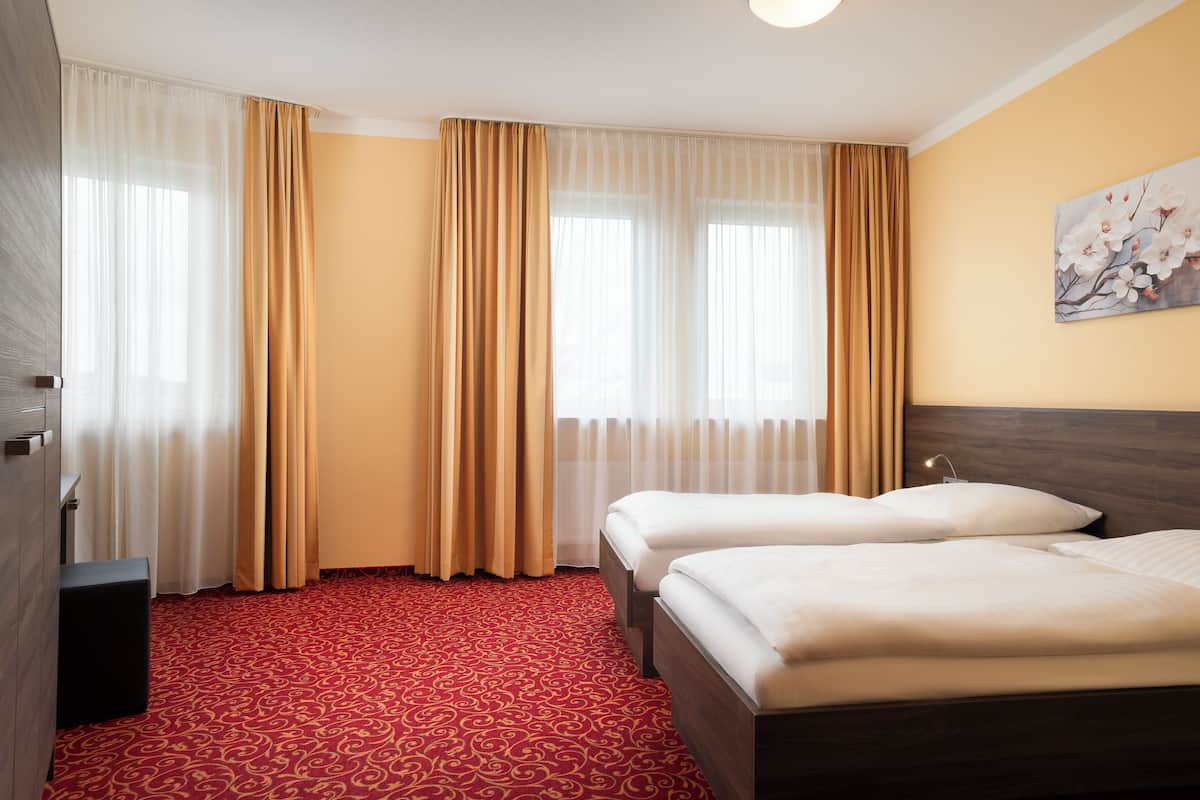 Twin Room, 2 Single Beds | In-room safe, desk, soundproofing, free WiFi