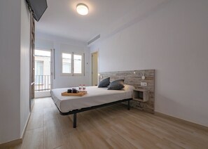 Habitación con 2 camas individuales | Wifi gratis y ropa de cama