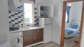 Deluxe-Apartment | Wohnbereich | LED-Fernseher