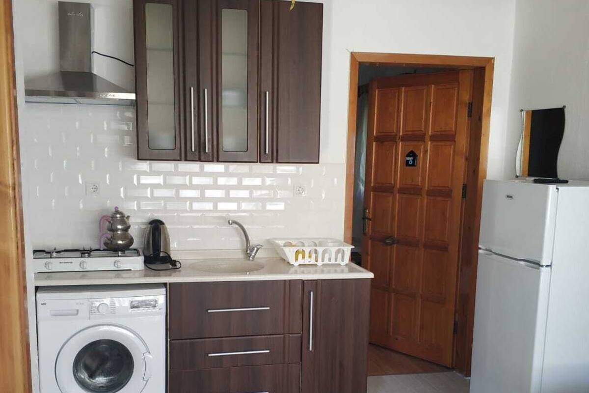 Familienapartment | Wohnbereich | LED-Fernseher