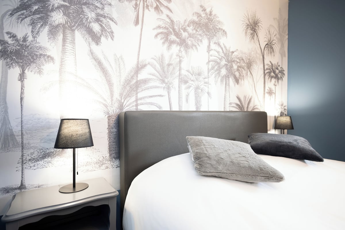 Chambre Jungle avec lit double, non-smoking | Free WiFi, bed sheets