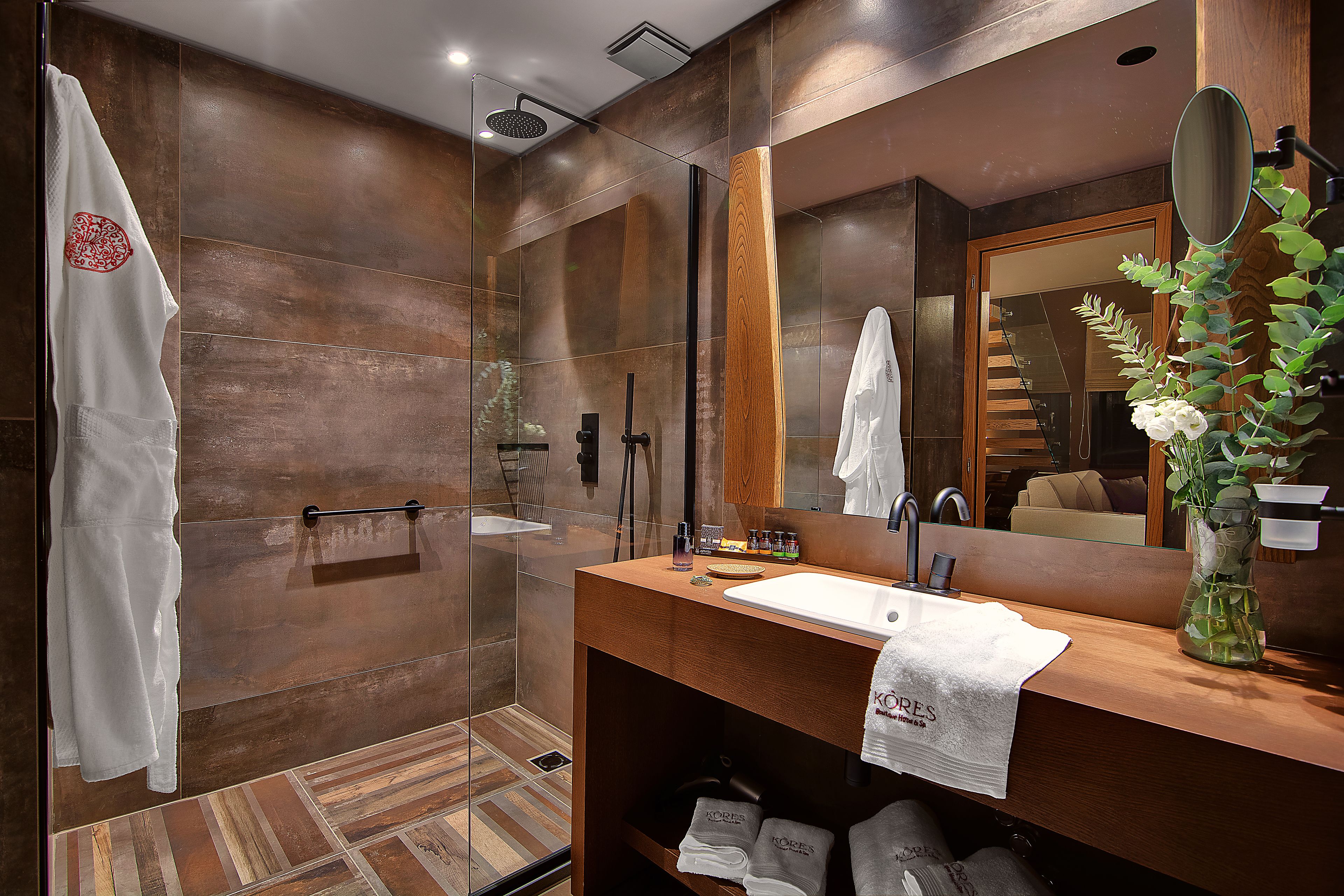 family studio suite, multiple beds | bathroom | shower, hydromassage showerhead, designer toiletries, hair dryer