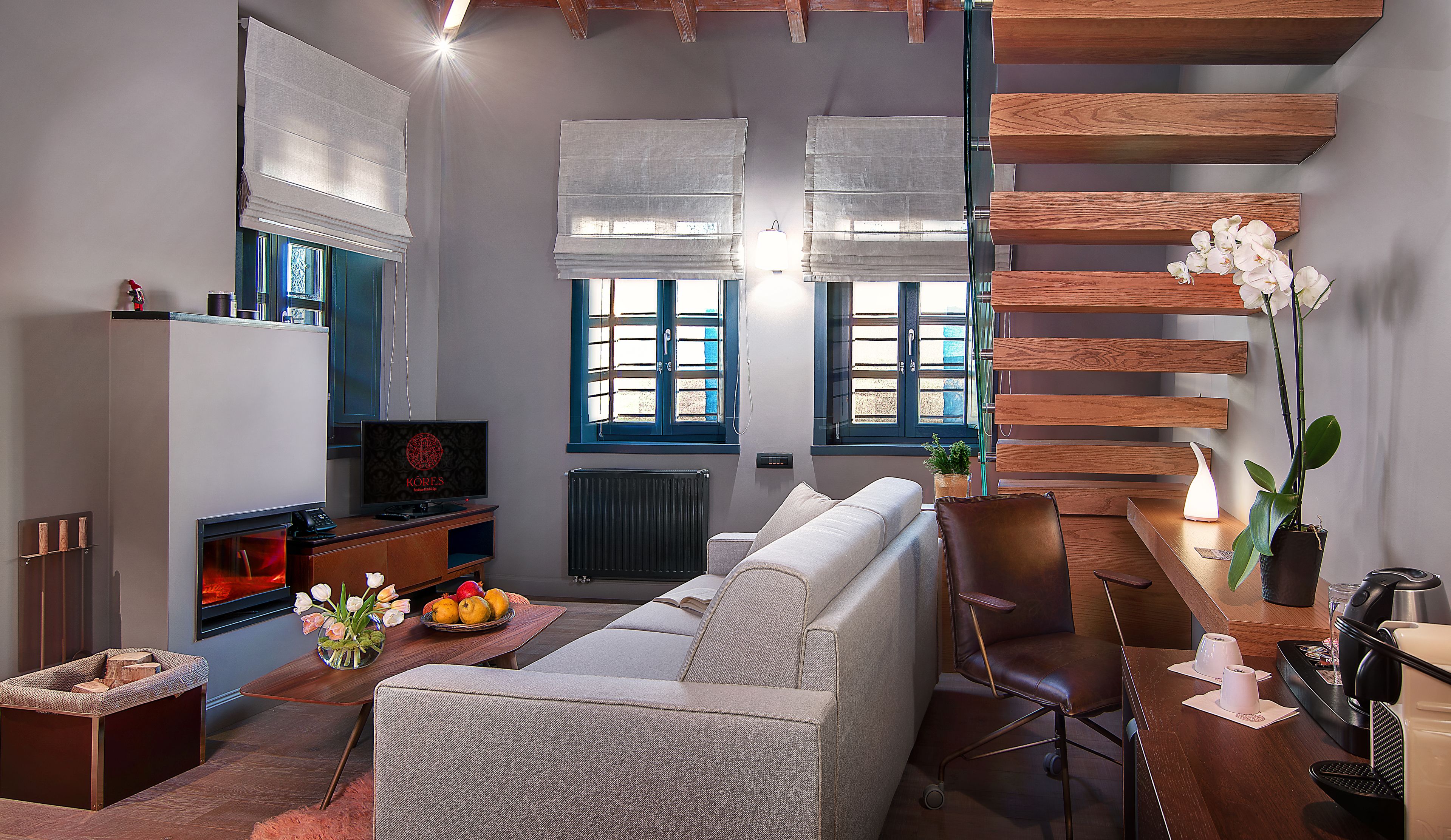 family studio suite, multiple beds | living area | 32-inch flat-screen tv with satellite channels, tv, dvd player