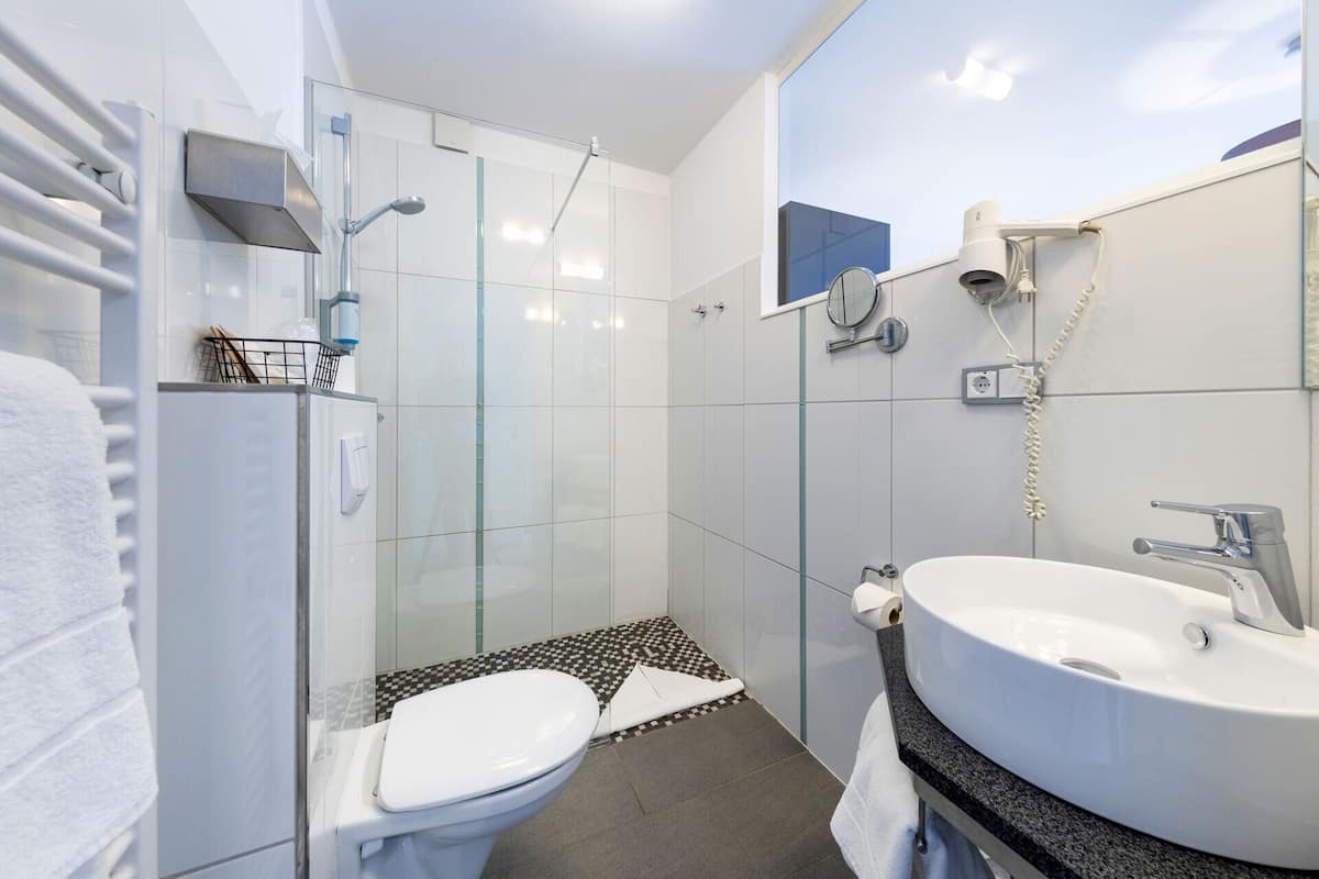 desk, blackout curtains, soundproofing, iron/ironing board