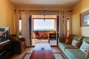 Apartment, 2 Bedrooms | Living room | Flat-screen TV