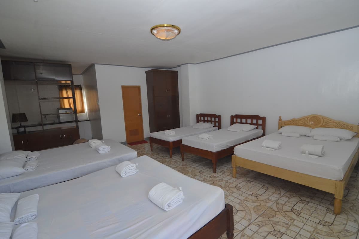 Dorm | Desk, iron/ironing board, bed sheets