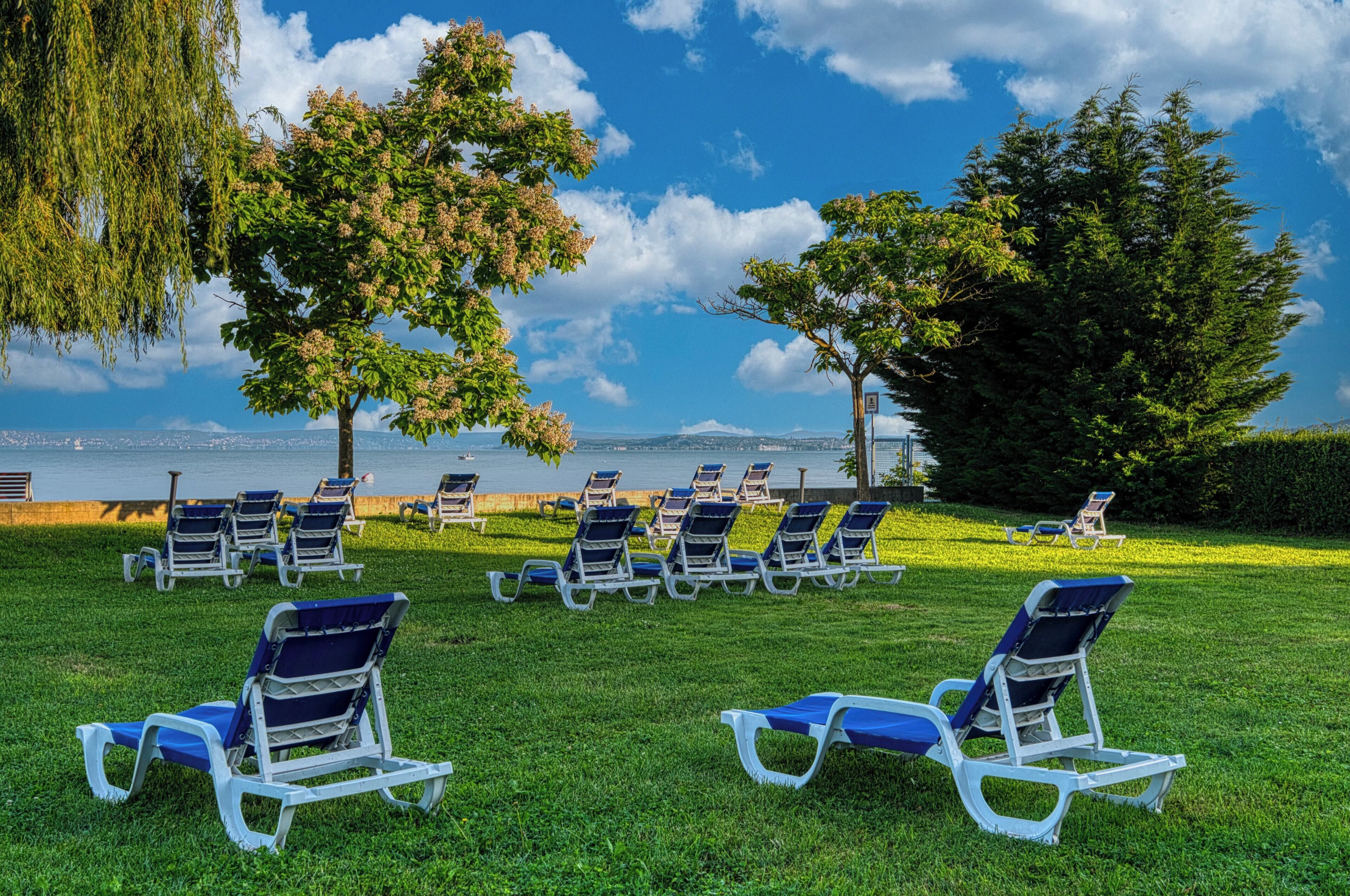 Sun-loungers, beach umbrellas, beach volleyball