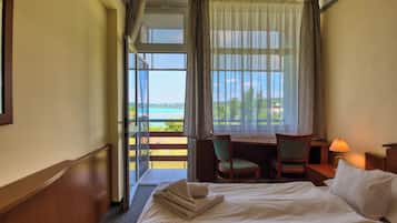 Standard Double Room | Desk, bed sheets