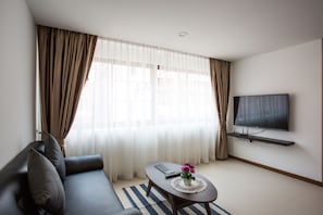 One Bedroom | Living room - The Suites Apartment & Residence Phuket (Patong)