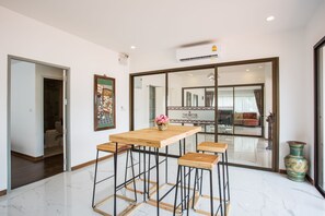 Romantic Penthouse, 2 Bedrooms, City View | In-room dining - The Suites Apartment & Residence Phuket (Patong)