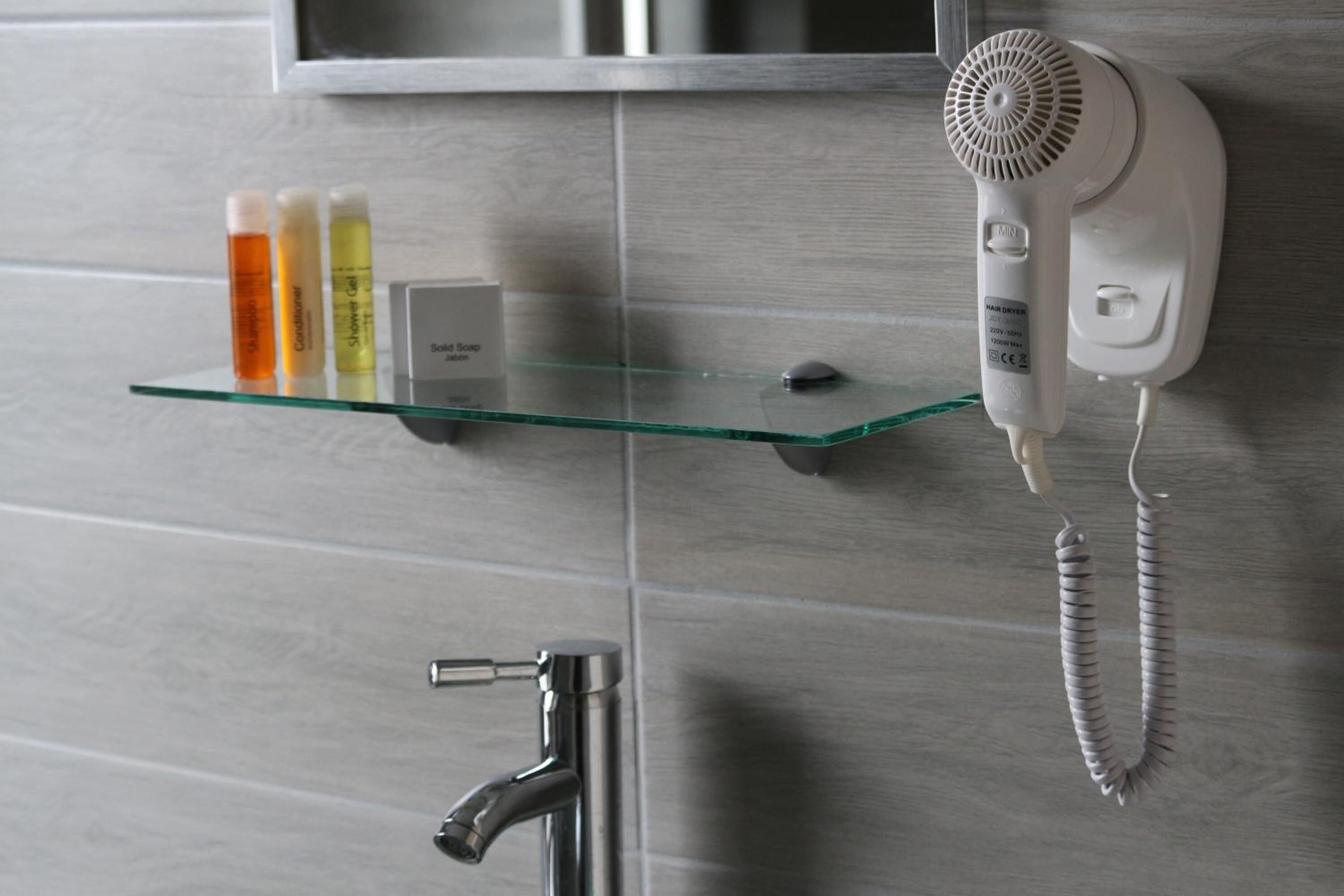 shower, free toiletries, hair dryer, dressing gowns