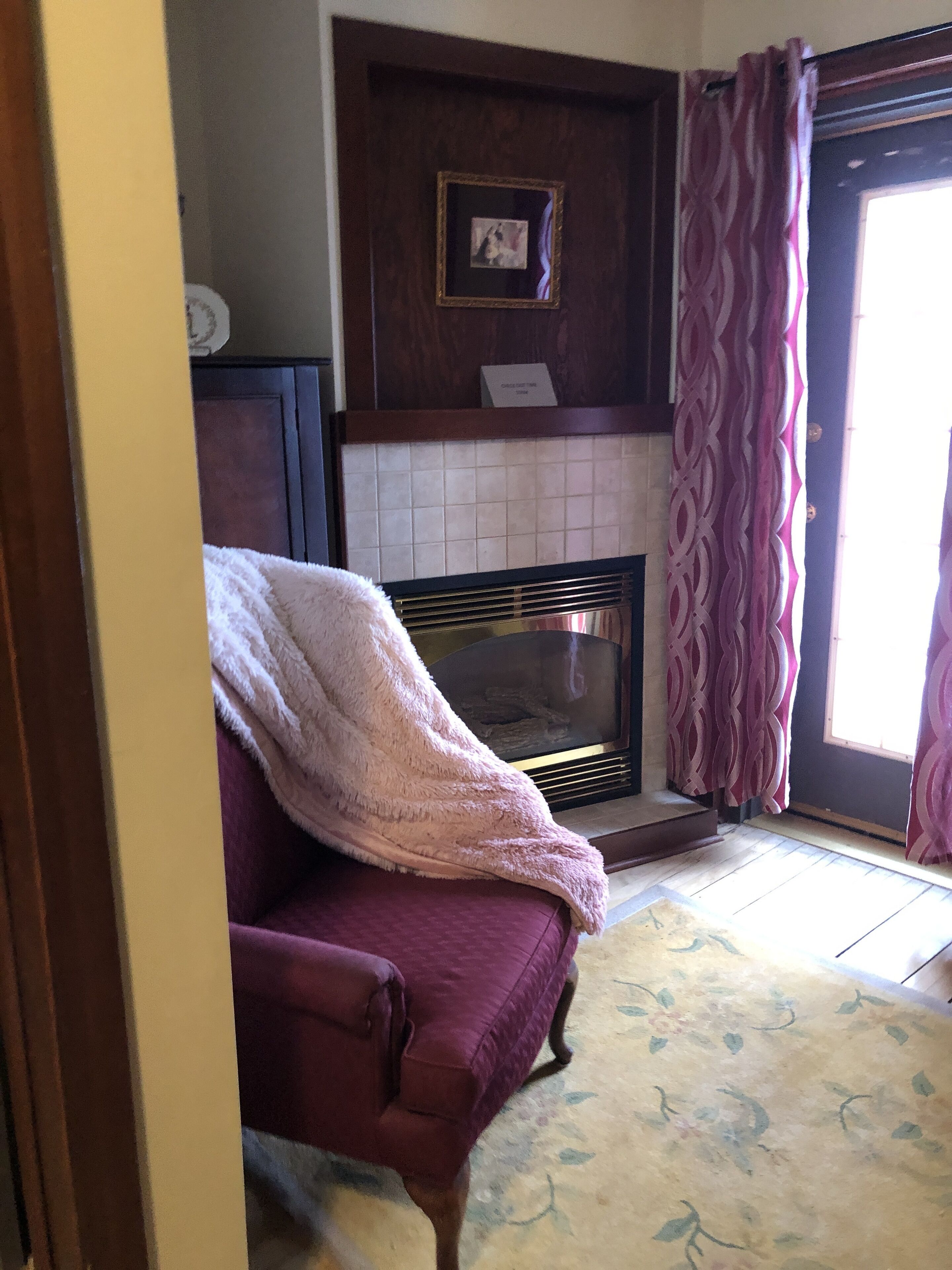 deluxe, 1 queen, fireplace | living area | table football, ping pong, books