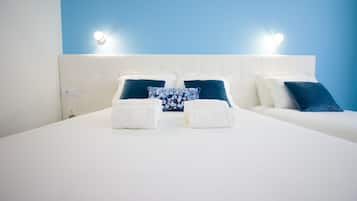 Habitación triple Deluxe | Wifi gratis y ropa de cama