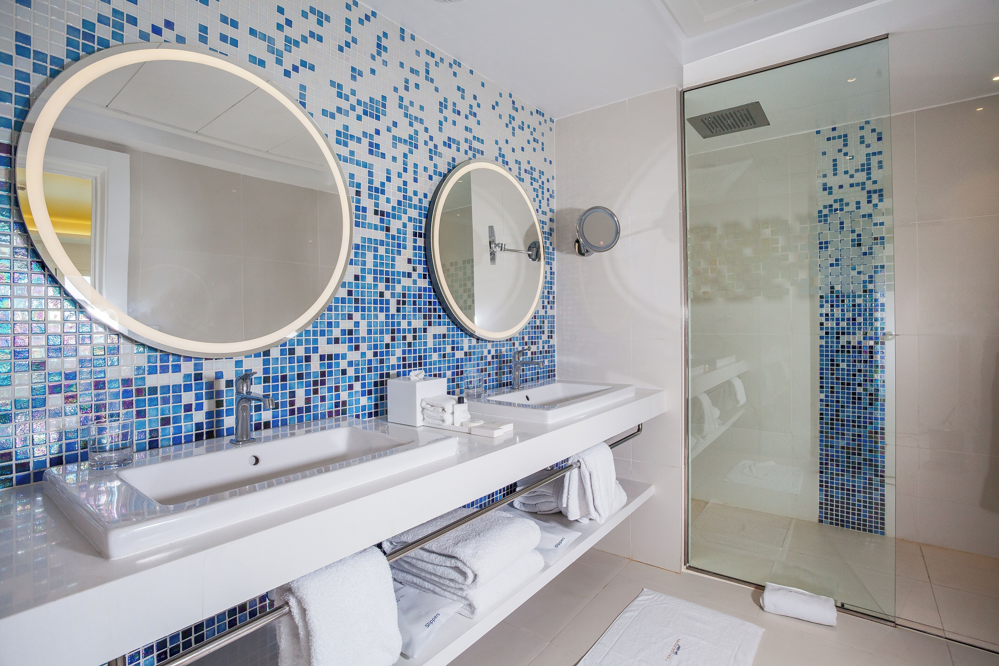 shower, designer toiletries, hair dryer, bathrobes