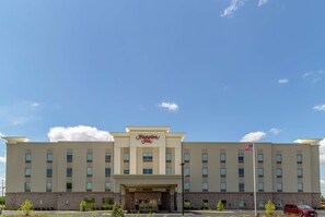 A Hampton Inn hotel with a symmetrical facade, multiple windows, and an American flag. - Hampton Inn Bourbonnais Kankakee (Bourbonnais)