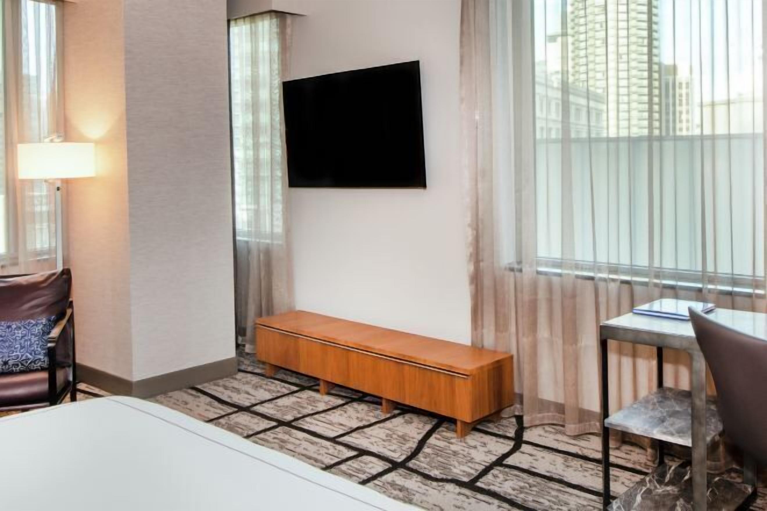 Premium bedding, down duvets, in-room safe, desk