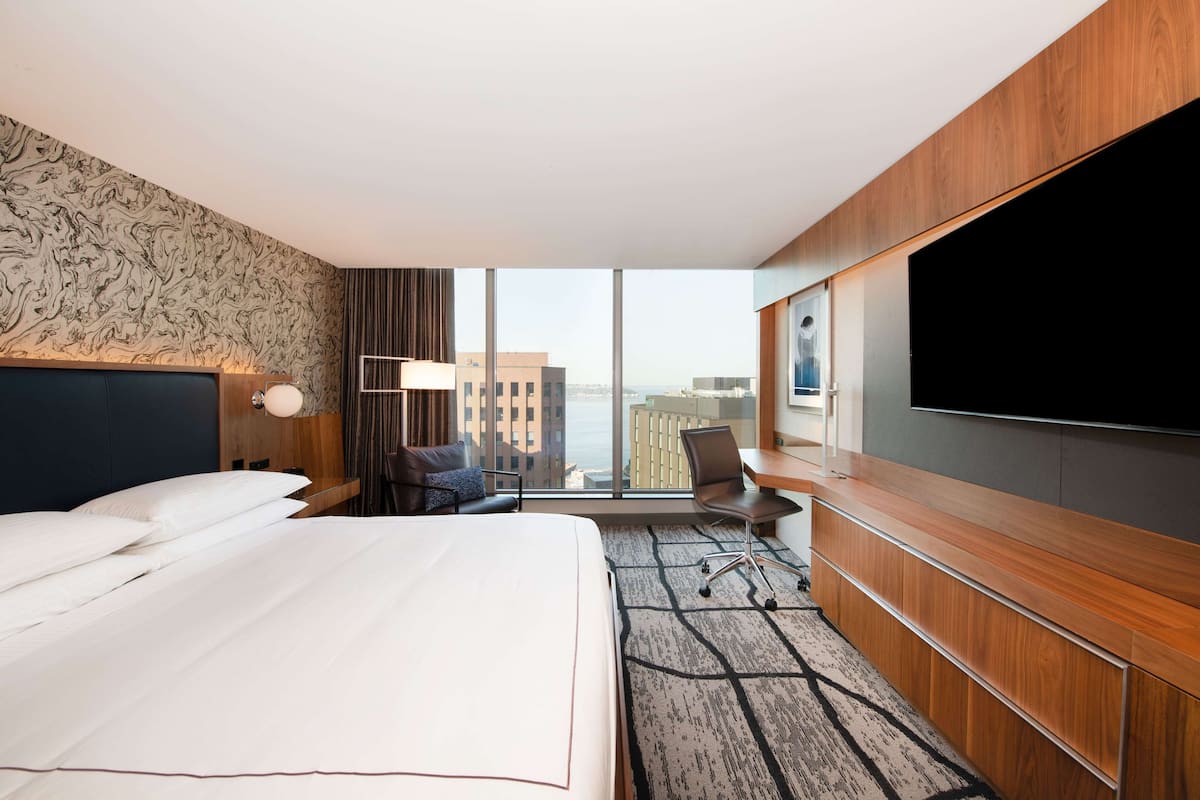 Premium bedding, down comforters, in-room safe, desk