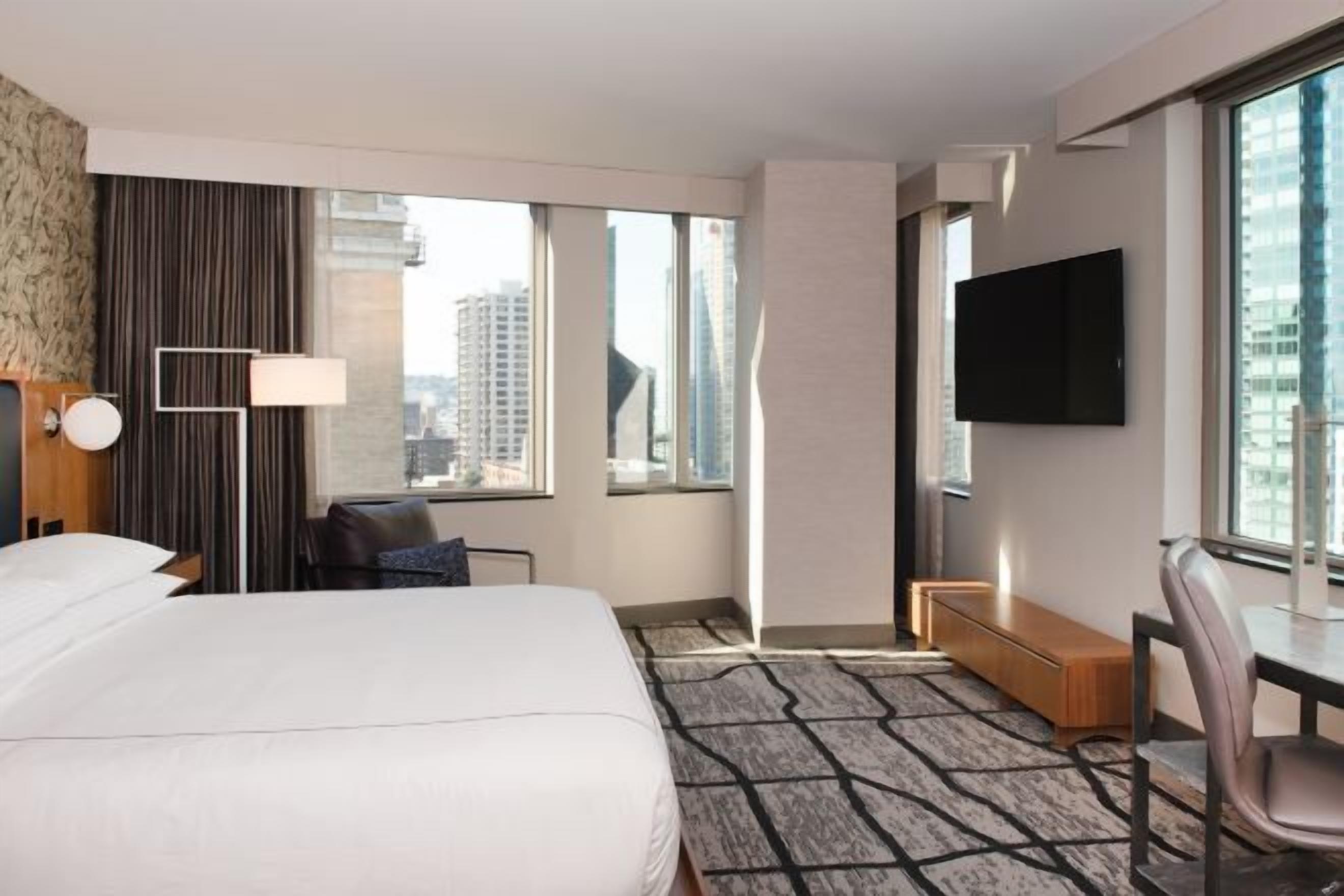 Premium bedding, down duvets, in-room safe, desk