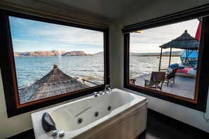 Comfort Room, Lake View | Down comforters, individually decorated, individually furnished - Uros LodgeTiticaca Peru (Puno)