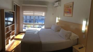 Basic Apartment, 1 King Bed (Single use) | 1 bedroom, minibar, in-room safe, desk