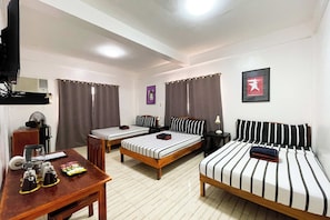 Habitación familiar | Caja de seguridad en la habitación, wifi gratis y ropa de cama 