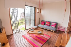 House, 4 Bedrooms | Living area | TV - Oceana Suites Cachito de Sol (Concon)