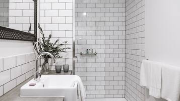 Shower, rainfall showerhead, designer toiletries, hair dryer
