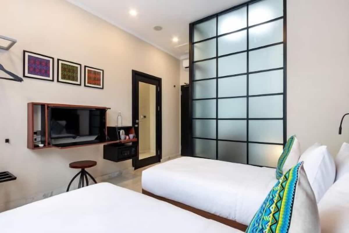 1 dormitorio, ropa de cama de alta calidad, minibar y caja fuerte