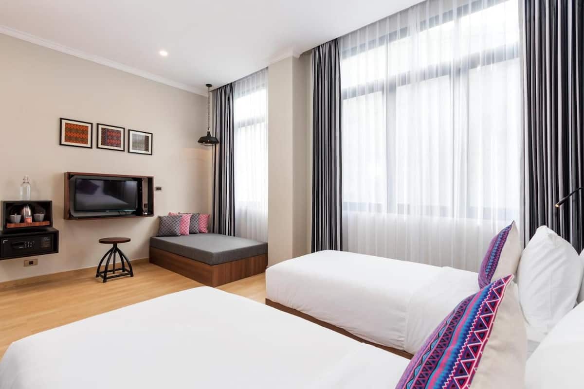 Habitación Deluxe con 1 cama doble o 2 individuales (Cozy) | 1 dormitorio, ropa de cama de alta calidad, minibar y caja fuerte