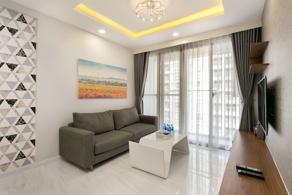 Deluxe Room, 2 Bedrooms, Kitchen, Pool View | Living area | Flat-screen TV - Jennifer Apartment Luxury 2BR SW Pool (Ho Chi Minh City)